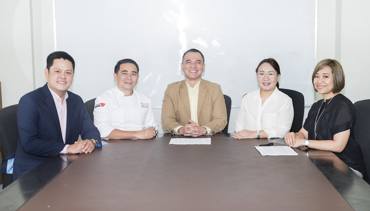 Jean Paul Manuud with staff
