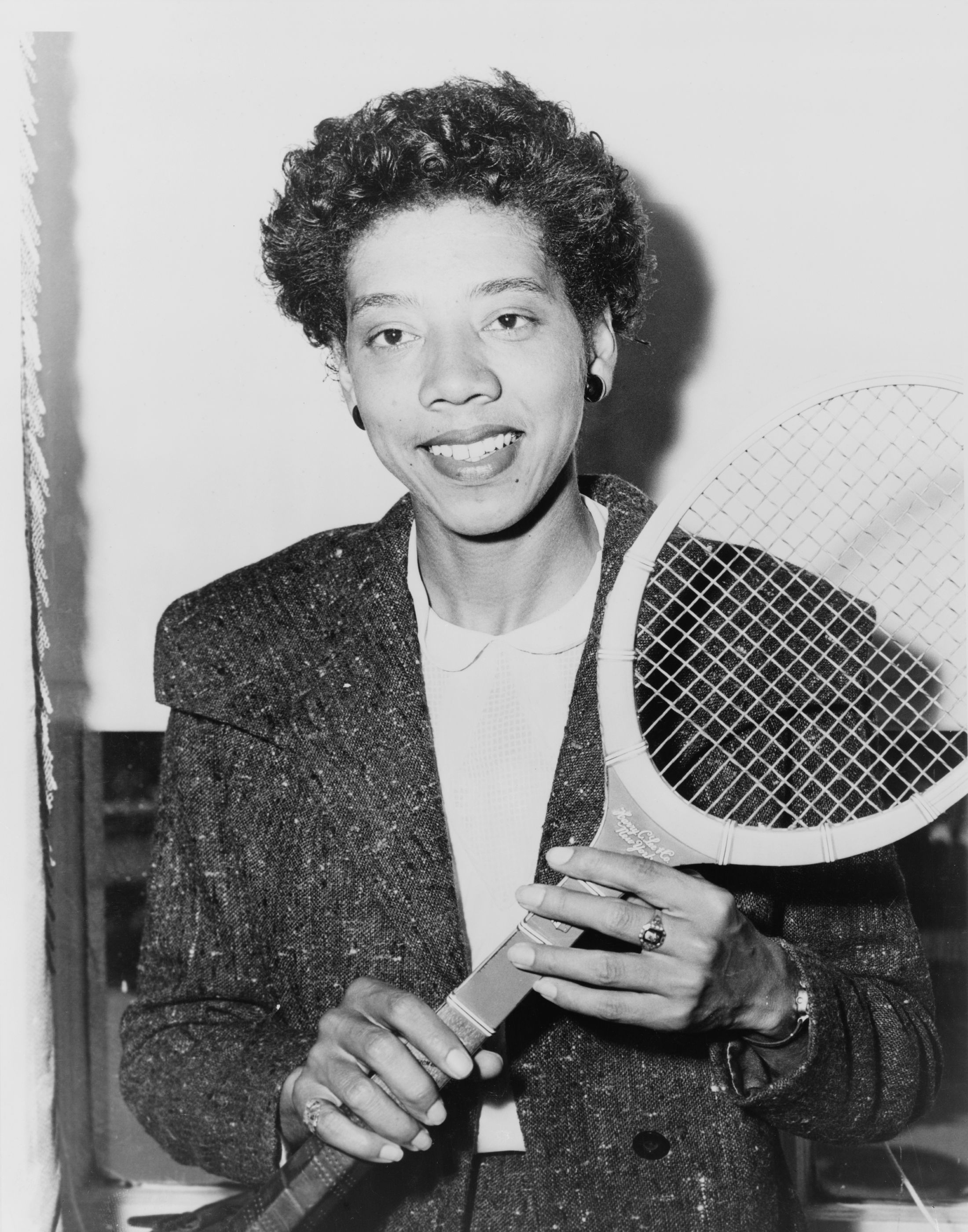 Althea Gibson, first black tennis player to win a Grand Slam title.