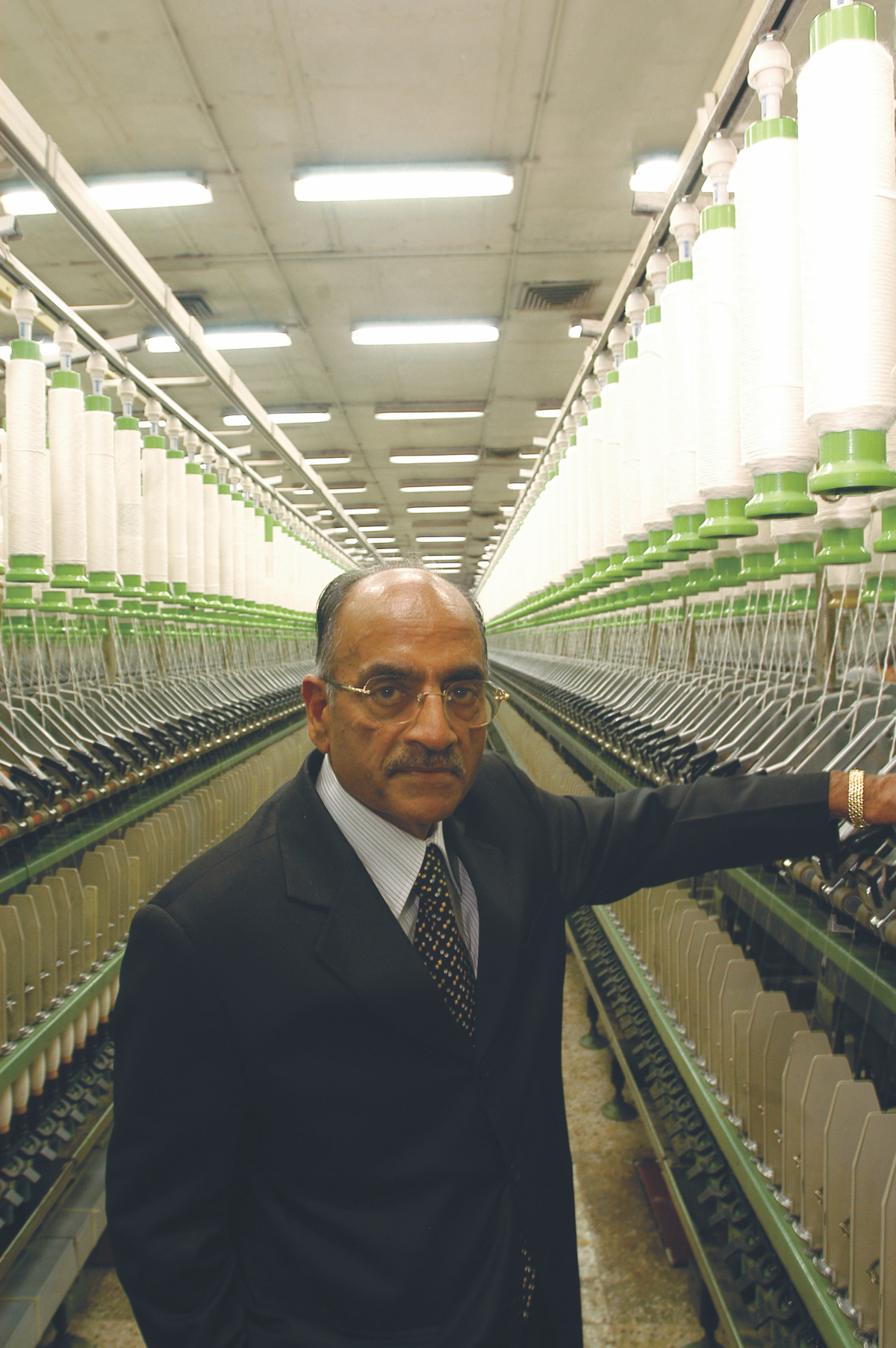 oswal industries chairman garment making factory