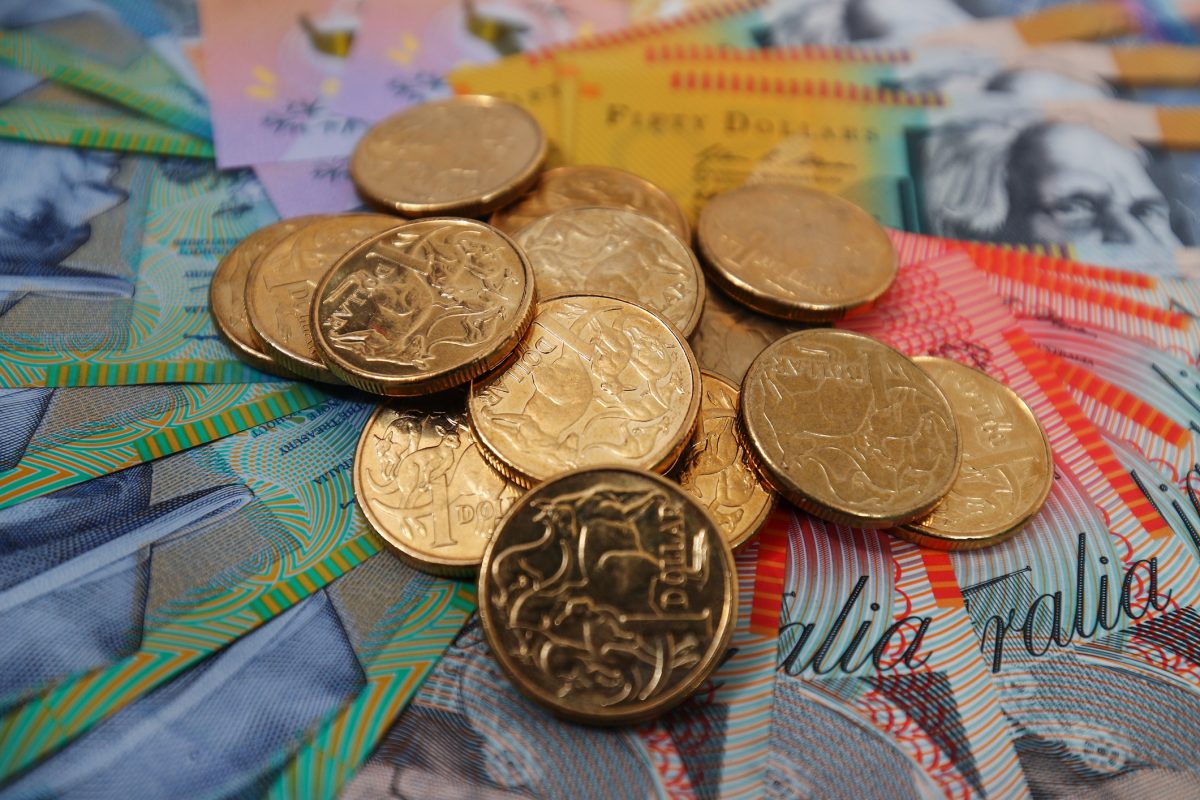 Australian one dollar coins and banknotes of various denominations A UBI is wrong.