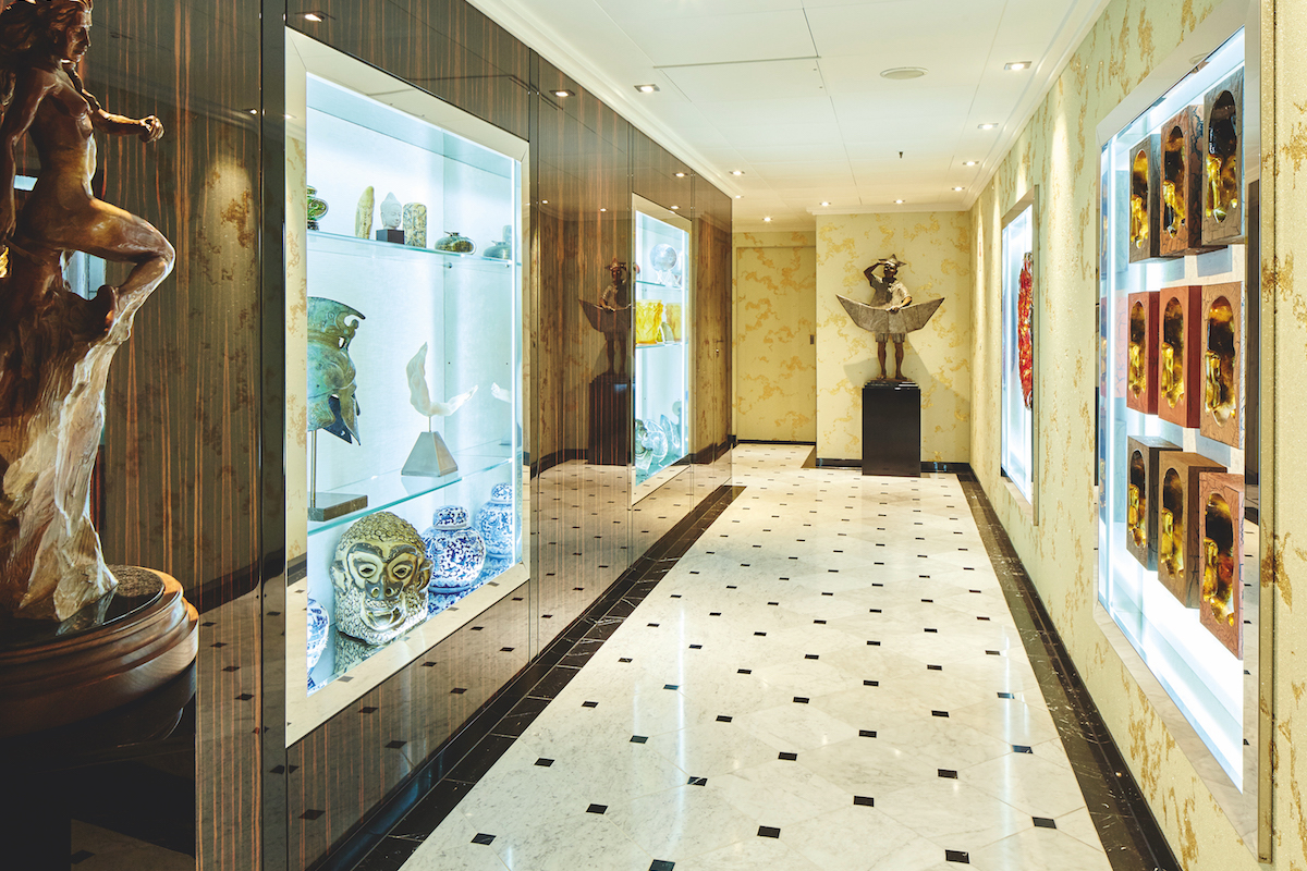 This lavish The World apartment foyer showcases priceless artwork