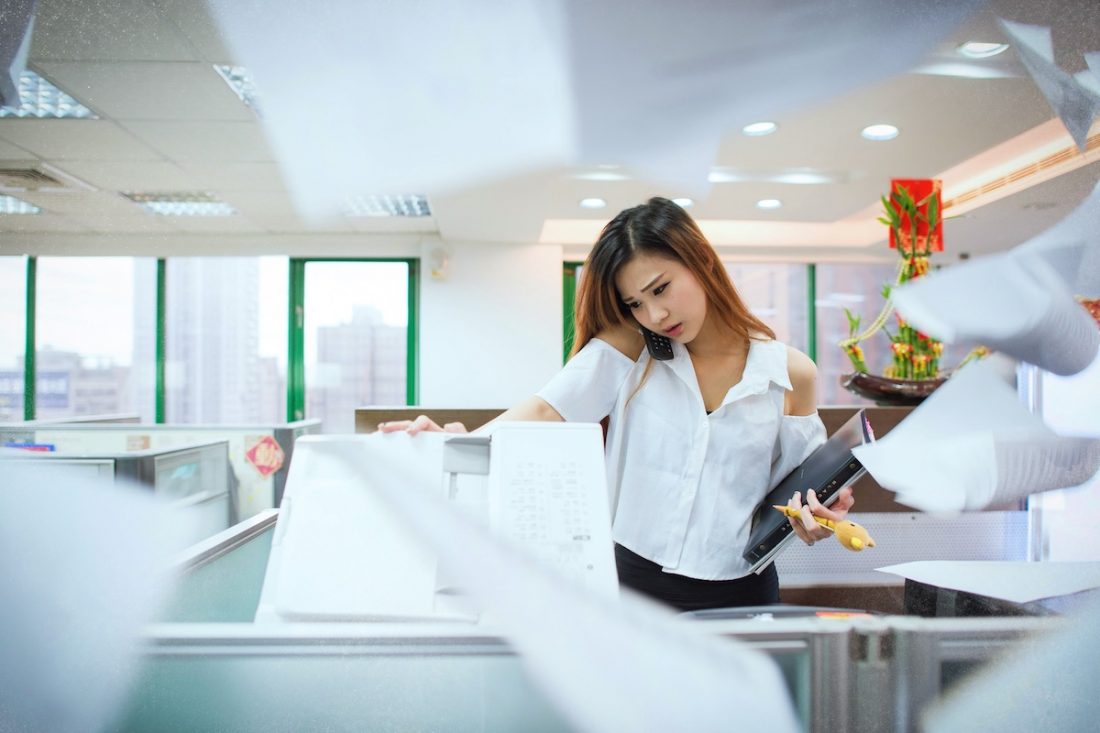 overworked-employee Overworked employee