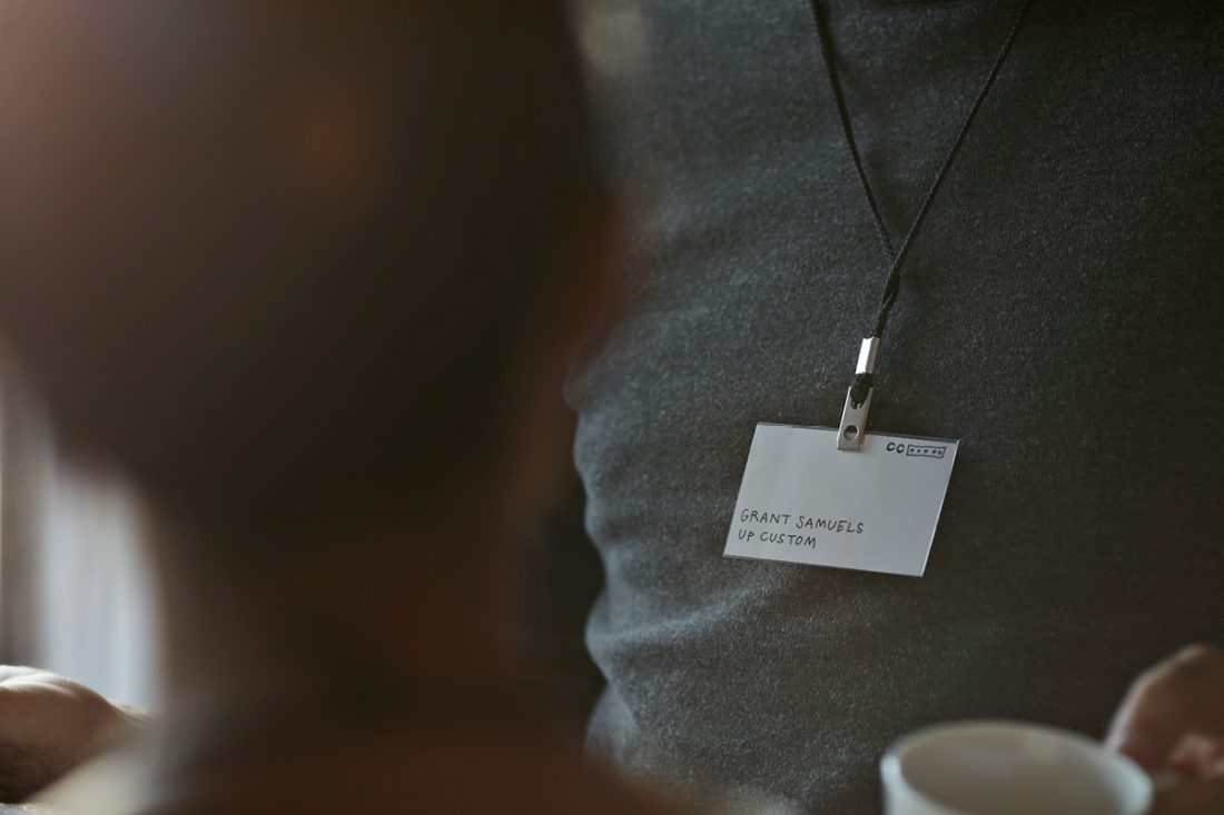2019.04.29_John-Drury-–-How-much-is-your-identity-tied-up-in-your-job- ID tag around worker's neck to show identity