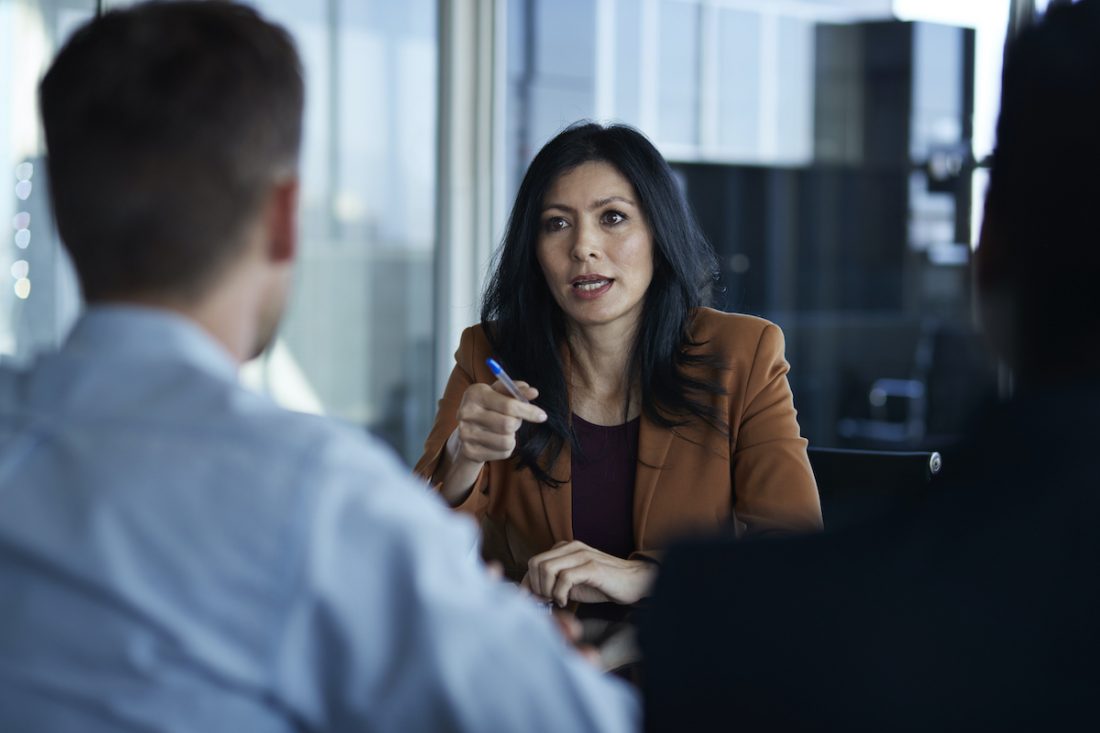 Business people having discussions in meeting room trust