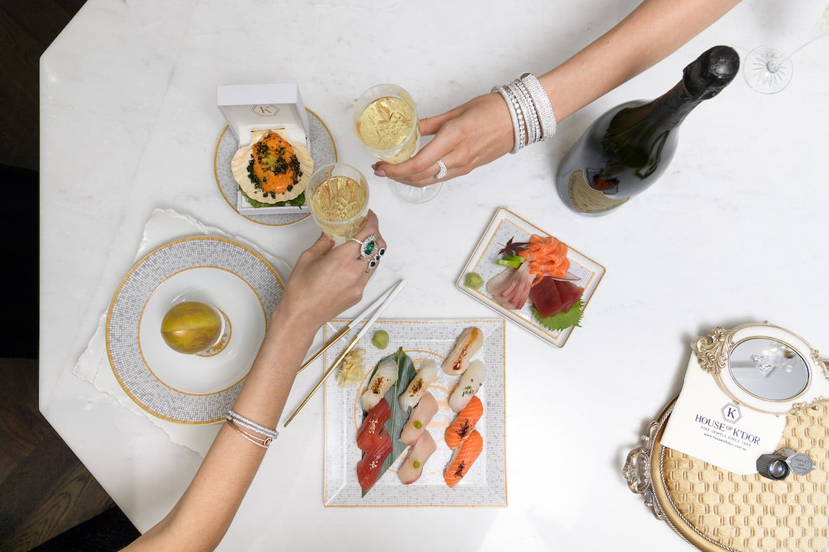 House of K'dor Consultation-with-champagne-and-sushi